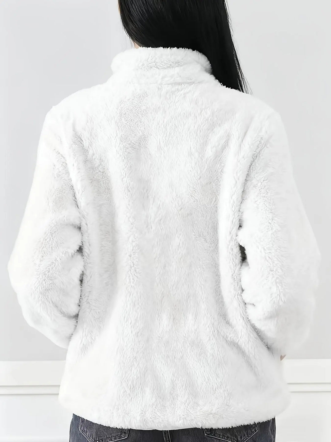 Textura polar premium suave y cálida.