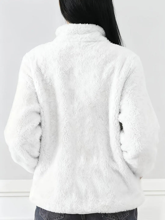 Textura polar premium suave y cálida.