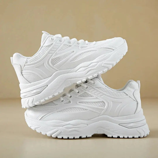 Zapatillas Vitalia Blancas: Confort y Estilo Premium para la Profesional Sanitaria.